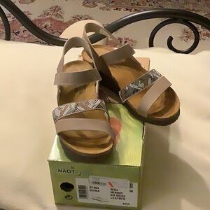 Naot strapy taupe Sandal with dad strap.  Worn once size 38